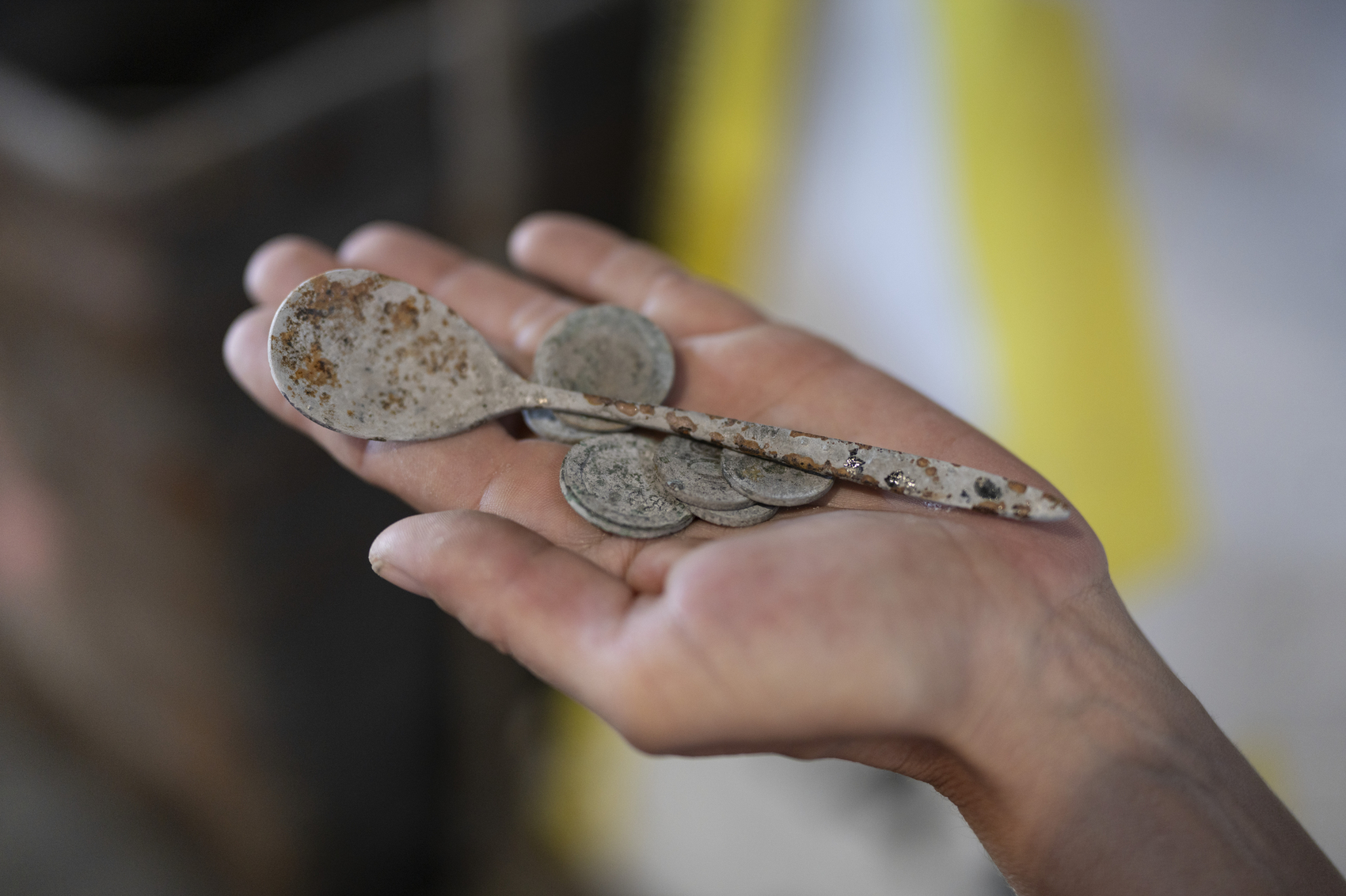 Recovered metal artifacts from IBA processing - a spoon and coins